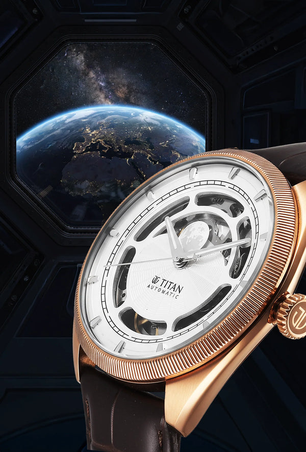 Titan Stellar Cupola automatic analog watch with sun, silver dial, and brown leather strap for men.
