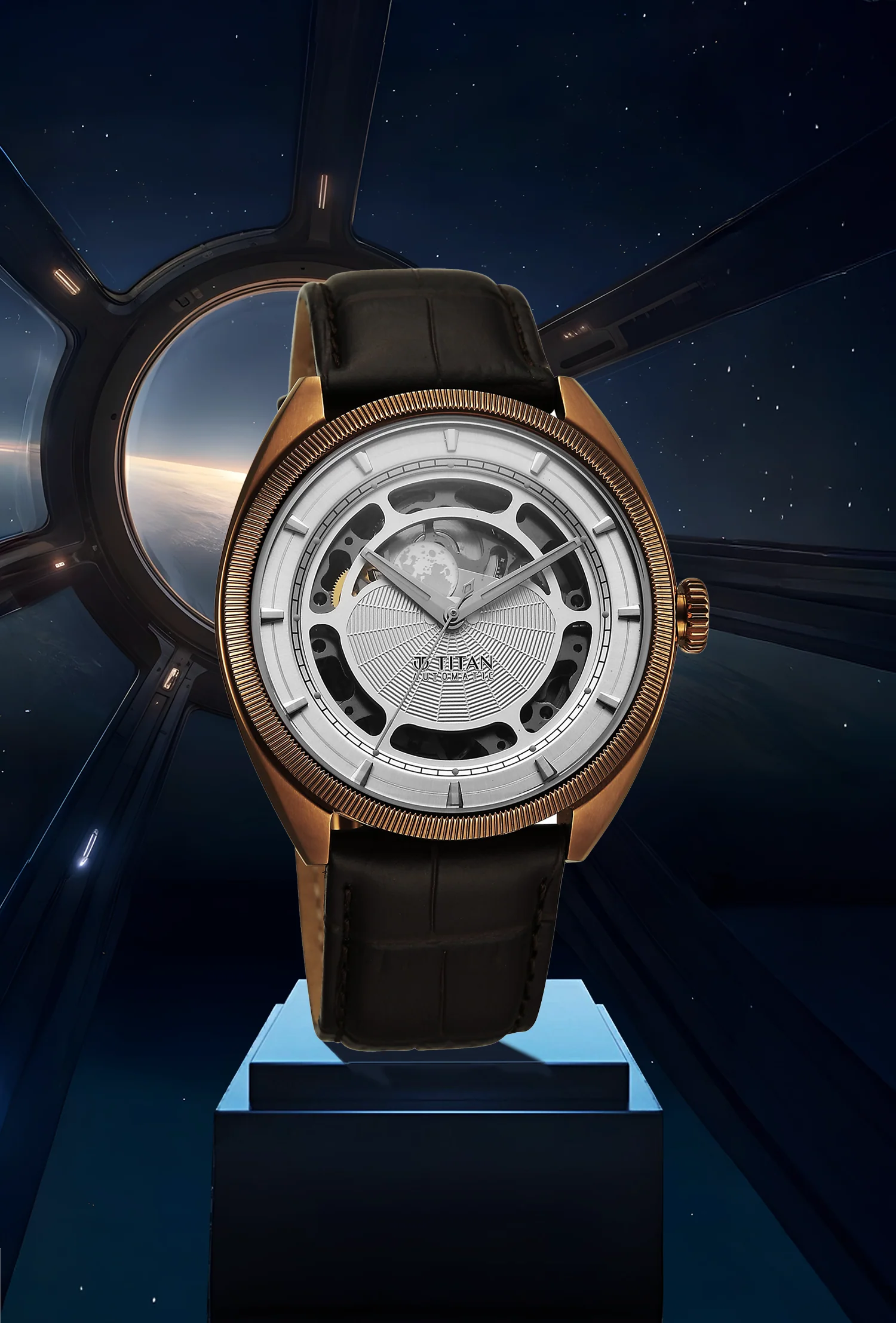 Luxury Titan Stellar Cupola automatic analog watch with sun, moon, skeleton dial, & brown strap.