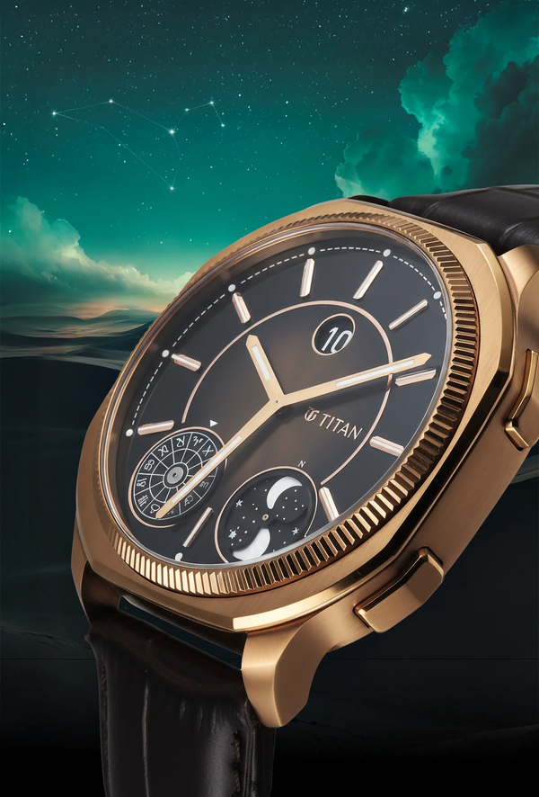 Close-up of Titan Stellar Zodiac analog watch with brown dial, dual moonphase, and jumping hour.