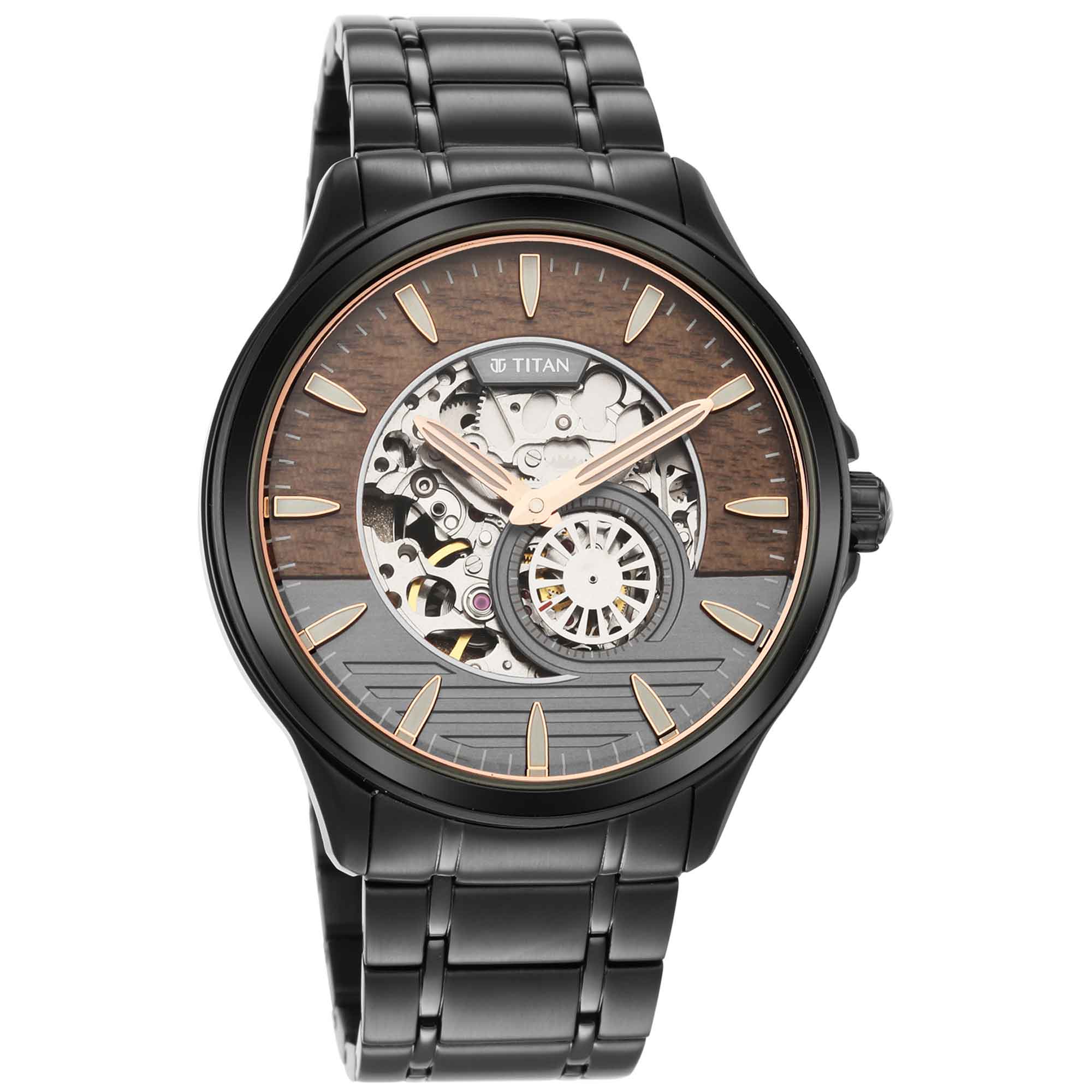 Front view of Titan automatic men's watch with skeleton black dial and stainless steel strap.