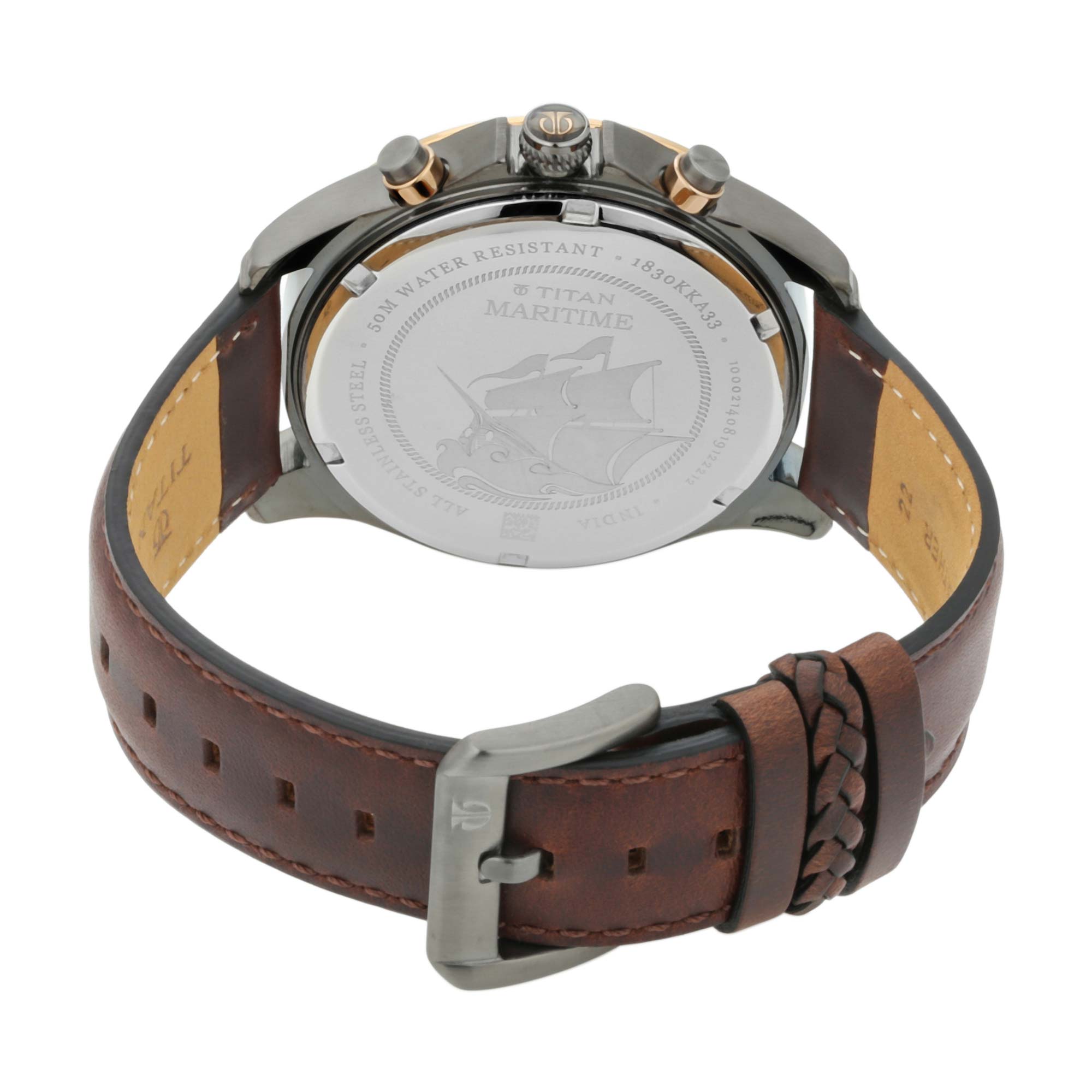 Backside view shows Titan Maritime watch with brown leather strap, engraved caseback, & buckle lock.