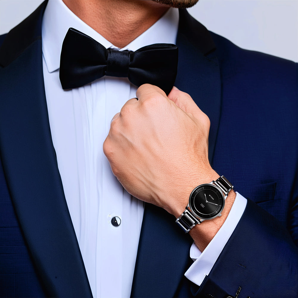 Titan Edge Fusion analog men’s watch style with a formal suit, showing a black dial & ceramic strap.