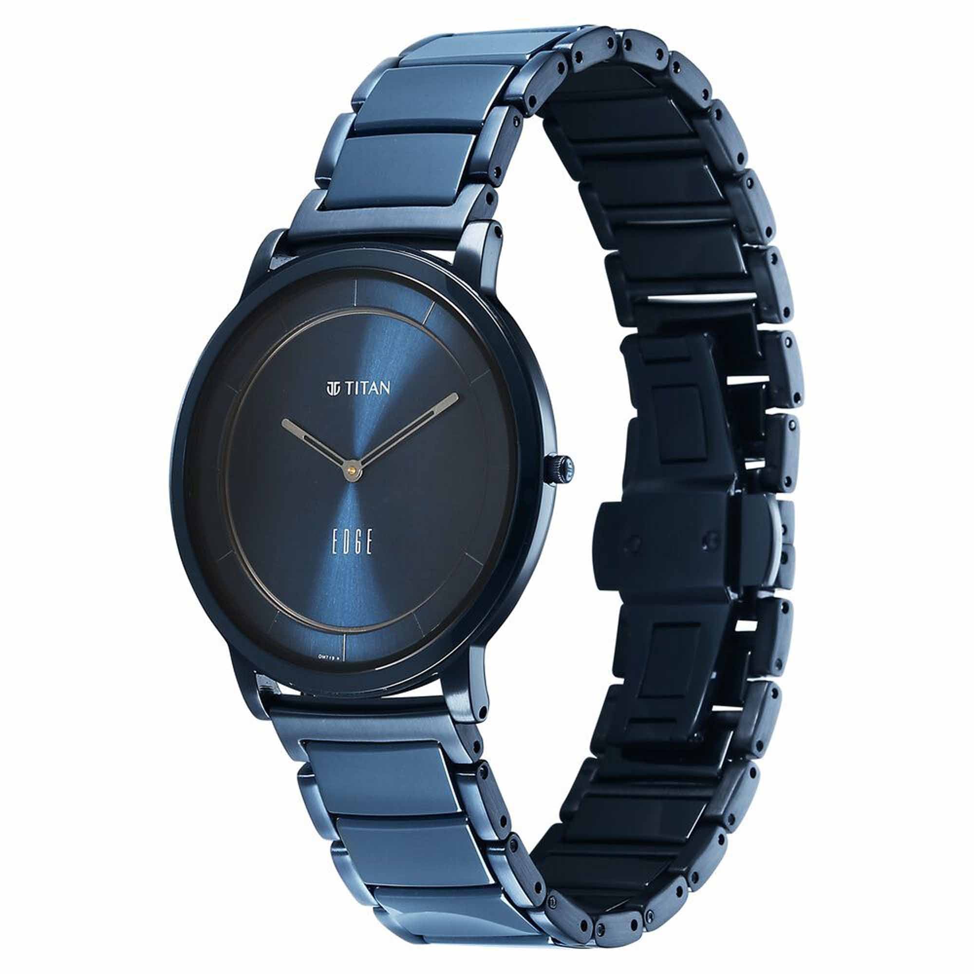 Side profile shows Titan Edge melange slim blue dial analog watch with curved steel ceramic strap.