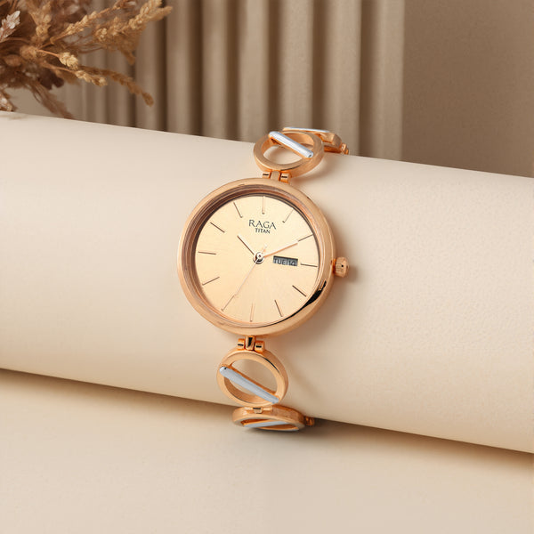 Titan Raga Viva Quartz Analog with Day and Date Rose Gold Dial Two Toned Metal Strap Watch For Women