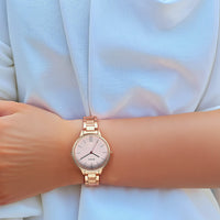 Titan Quartz Analog Rose Gold Dial Watch for Women