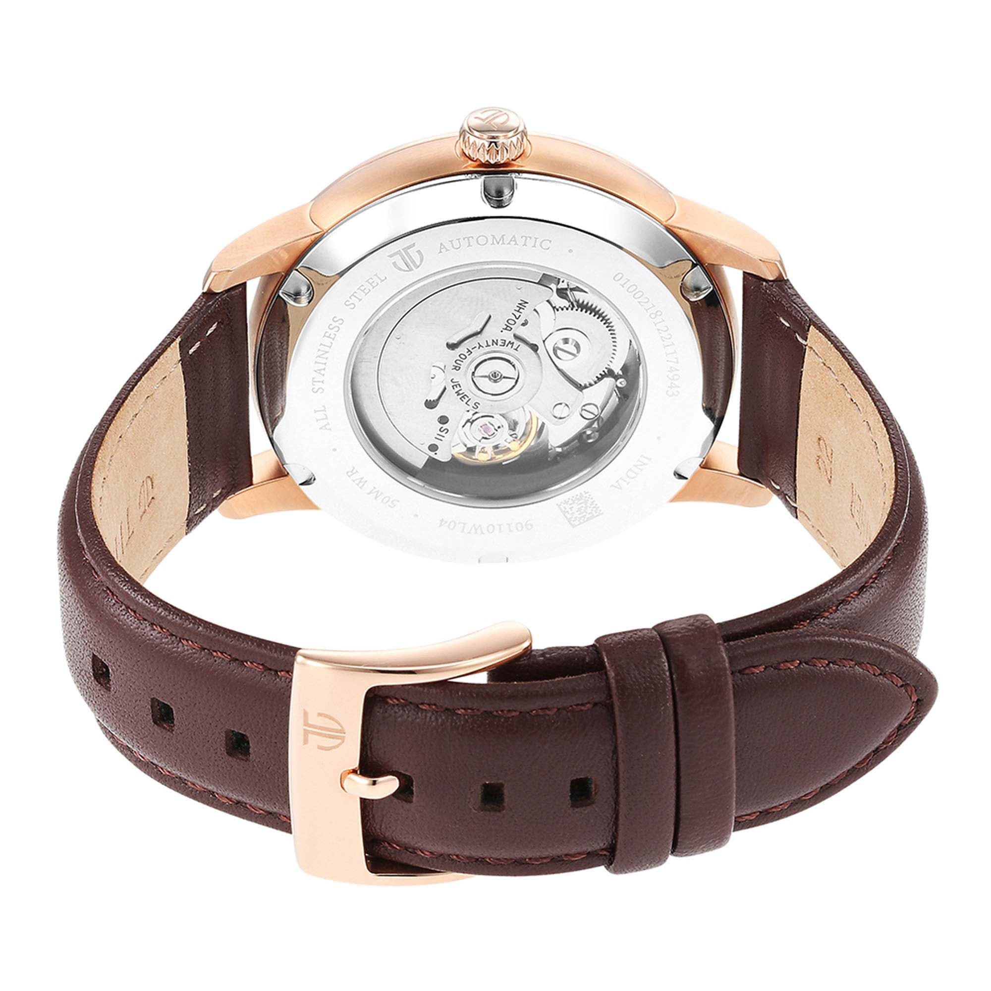 Rear caseback of Titan automatic watch for men showing mechanical movement with brown leather strap.