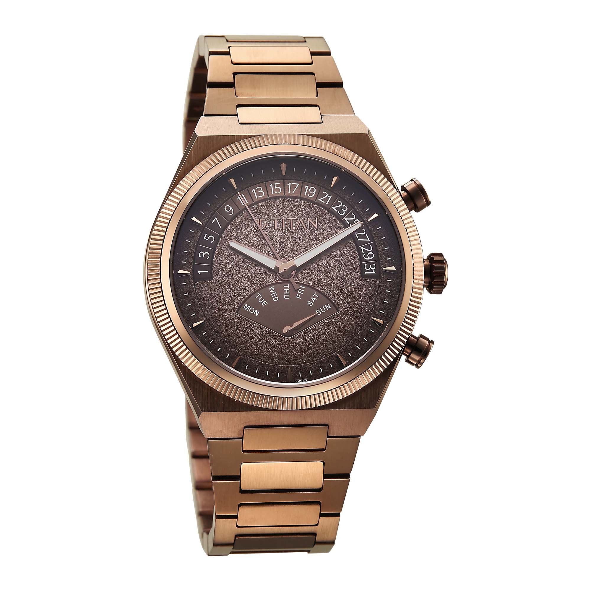 Angled view of Titan micromotors analog watch showing the fluted bezel, brown dial, & side pushers.