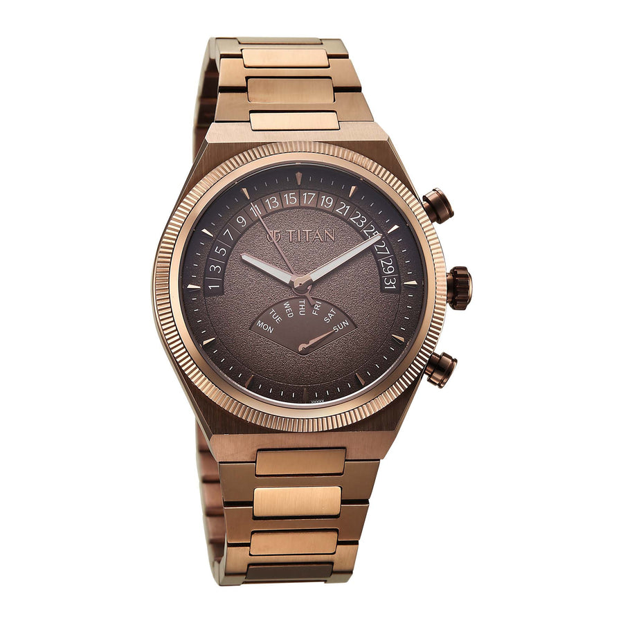 Angled view of Titan micromotors analog watch showing the fluted bezel, brown dial, & side pushers.