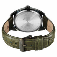 Back view reveals Titan watch stainless steel caseback with engraved branding & green strap buckle.