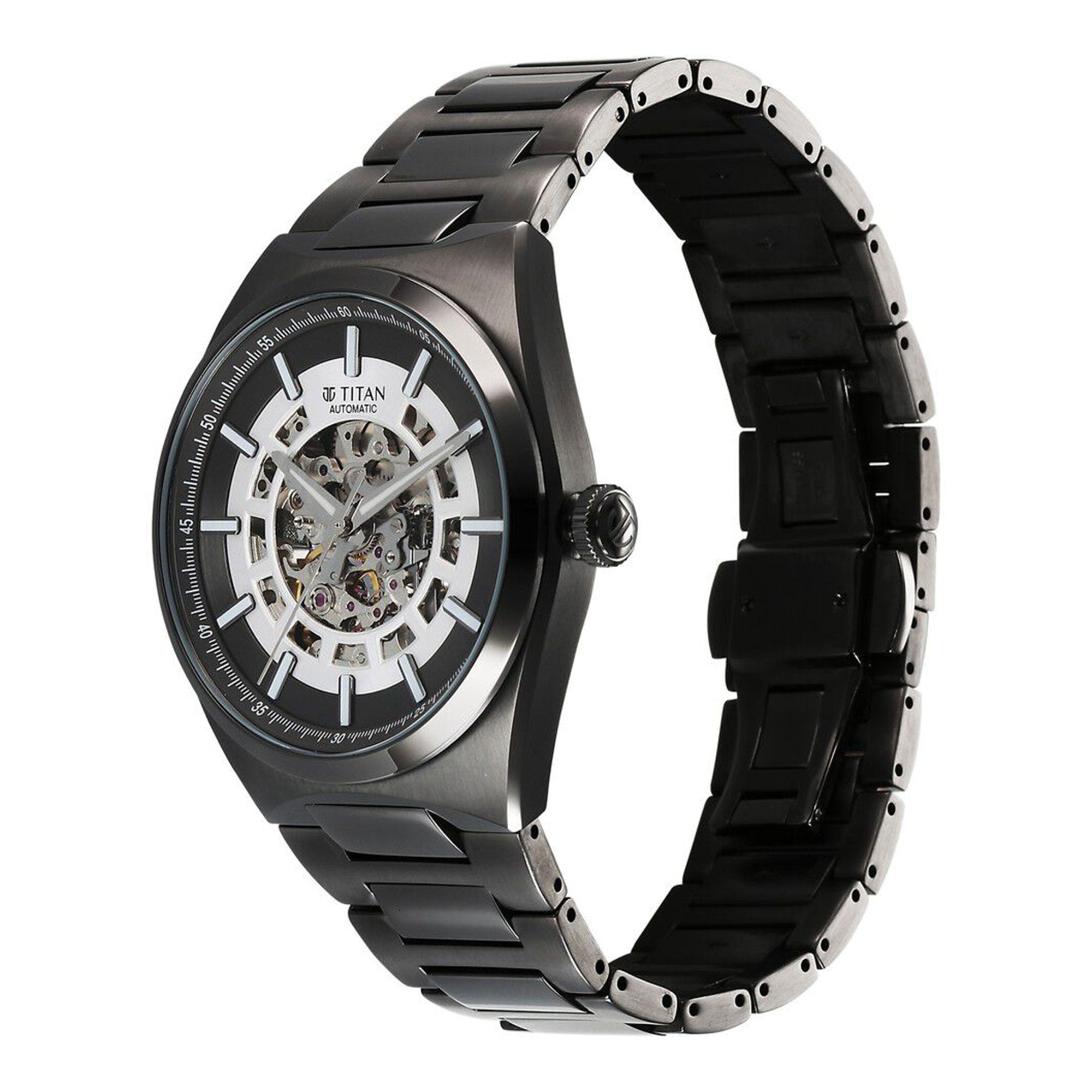 Angled view of black Titan Nexus skeletal automatic analog watch for men with stainless steel strap.