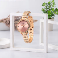 Titan Raga Showstopper Quartz Analog Pink Round Dial Rose Gold Metal Strap Watch For Women