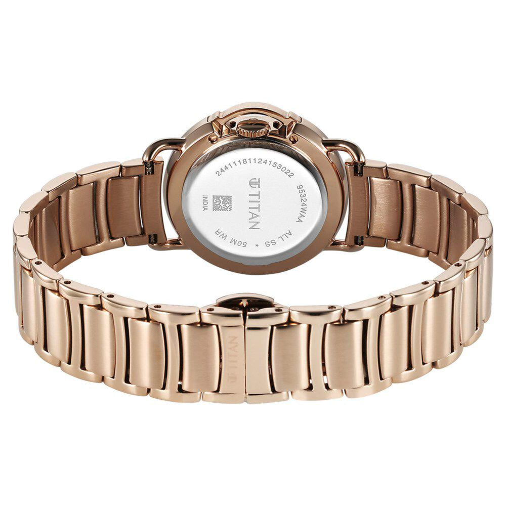 rose gold metal watch
